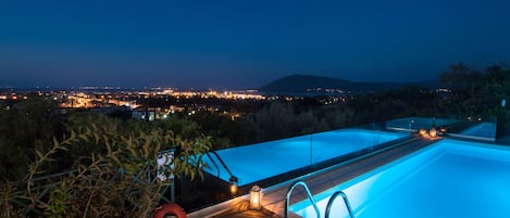 2 outdoor pools, pool umbrellas, sun loungers