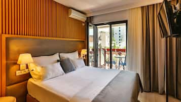 Family Quadruple Room, Multiple Beds, Non Smoking, City View | Minibar, in-room safe, blackout drapes, soundproofing