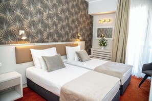 Classic Double or Twin Room (LUX) | Minibar, in-room safe, desk, blackout drapes