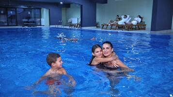 Indoor pool, open 10:00 AM to 1:00 PM, sun loungers, lifeguards on site