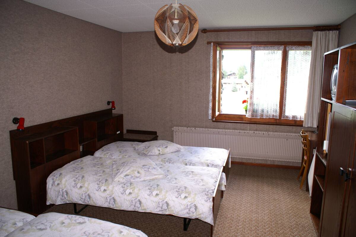 Ropa de cama de alta calidad y cortinas blackout