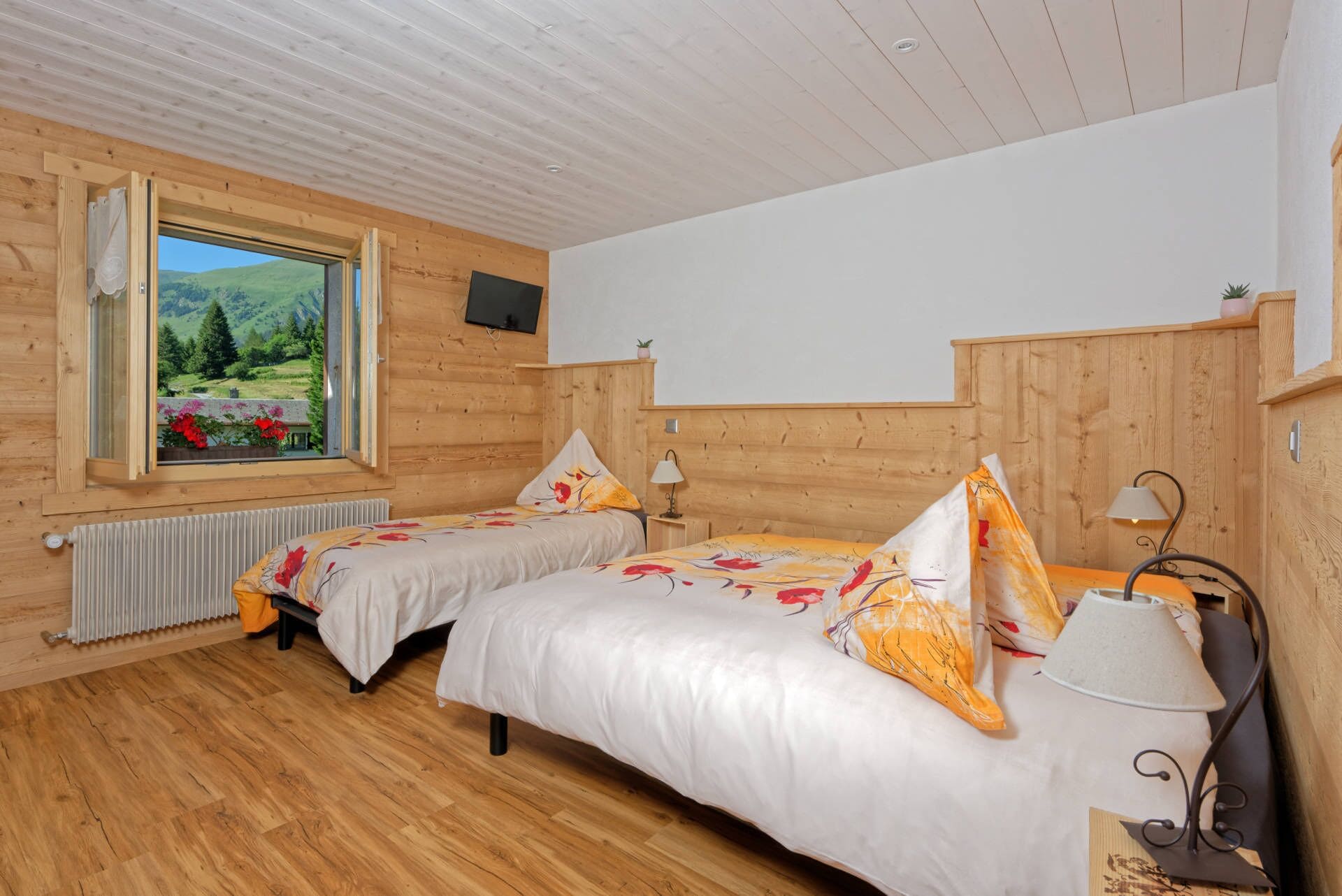 family quadruple room, non smoking, mountain view | premium bedding, blackout curtains, iron/ironing board, free wifi