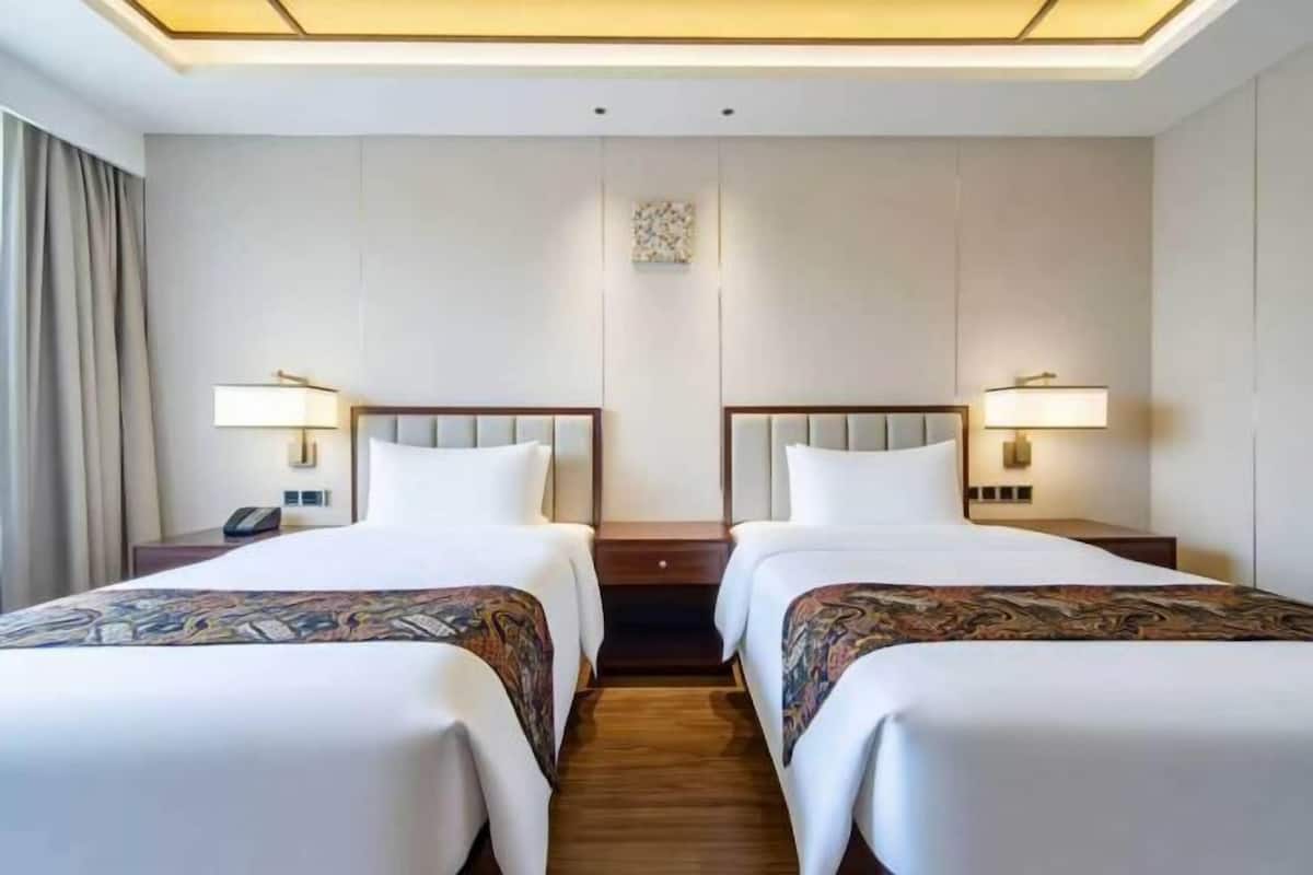 Literie de qualité supérieure, coffres-forts dans les chambres