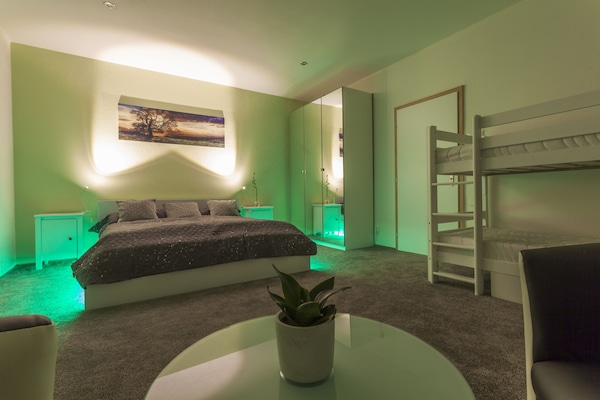 Superior Apartment, Multiple Beds, Garden View | 1 bedroom, memory foam beds, in-room safe, desk