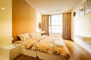 Family Apartment, 2 Bedrooms, City View | Desk, blackout drapes, soundproofing, iron/ironing board