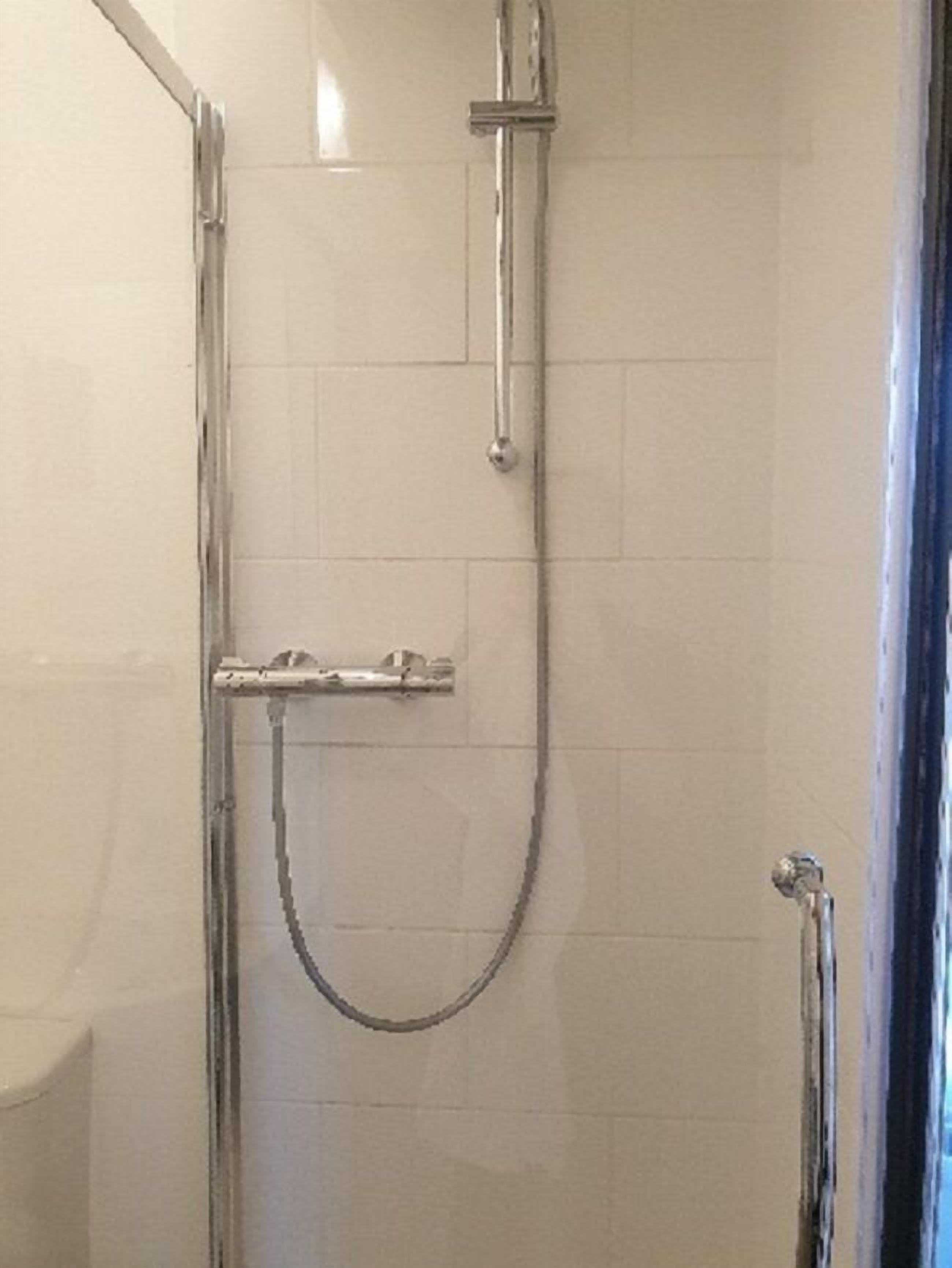 Regadera en el baño
