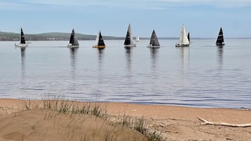 On the beach, sun loungers, beach towels
