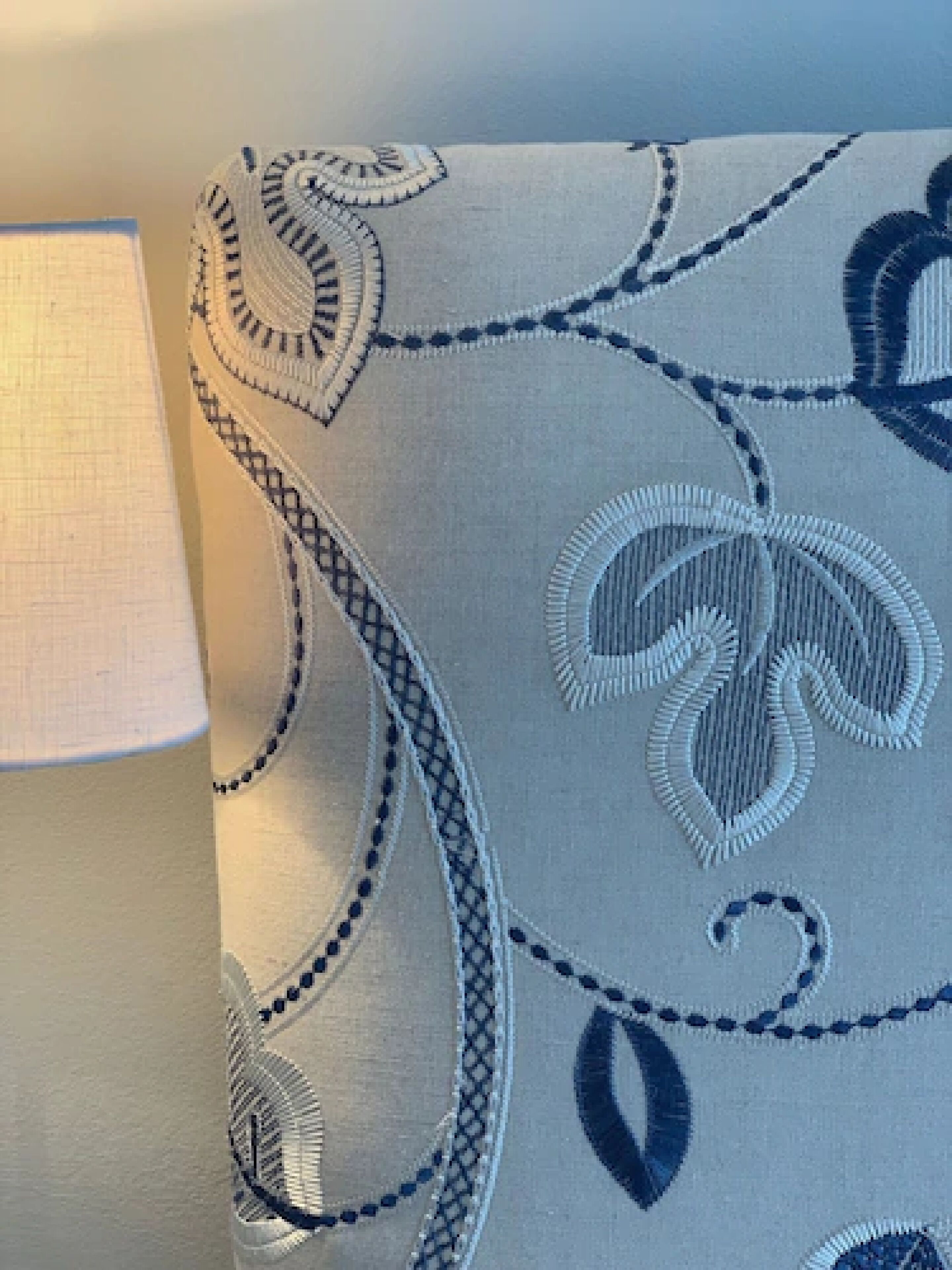 A close-up of a fabric with a paisley pattern.