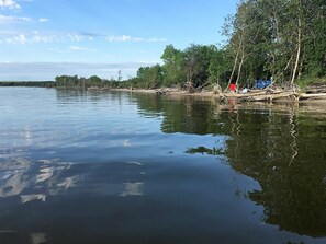 On the beach, sun-loungers, beach towels