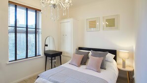 Luxury Apartment, Multiple Beds, Non Smoking, Beach View | 3 bedrooms, desk, laptop workspace, iron/ironing board