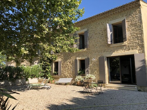 Superb apartment in a restored Provencal Mas.