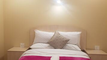 Double or Twin Room | Minibar, desk, iron/ironing board, free cots/infant beds