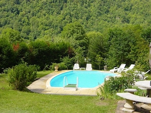 Seasonal outdoor pool, open 11:00 AM to 9:00 PM, pool umbrellas