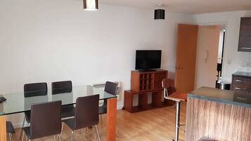 Comfort Apartment, 1 Bedroom, Non Smoking | Living room | Flat-screen TV