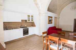 Réfrigérateur dans l'espace commun