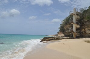 On the beach, sun loungers, beach towels