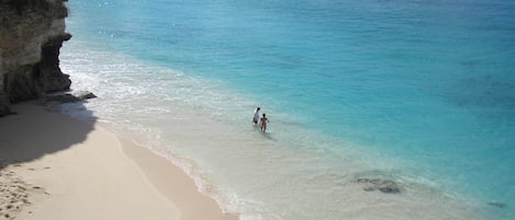On the beach, sun-loungers, beach towels