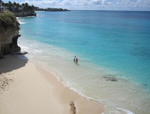 On the beach, sun loungers, beach towels
