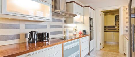 Premium House, Multiple Beds, Non Smoking | Private kitchen | Full-size fridge, microwave, oven, stovetop