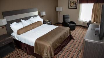 Chambre, 1 trÚs grand lit, accessible aux personnes à mobilité réduite, non-fumeurs (Roll-In Shower) | Espace de travail pour ordinateur portable, rideaux occultants