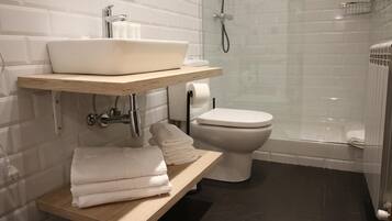 Shower, free toiletries, hair dryer, towels