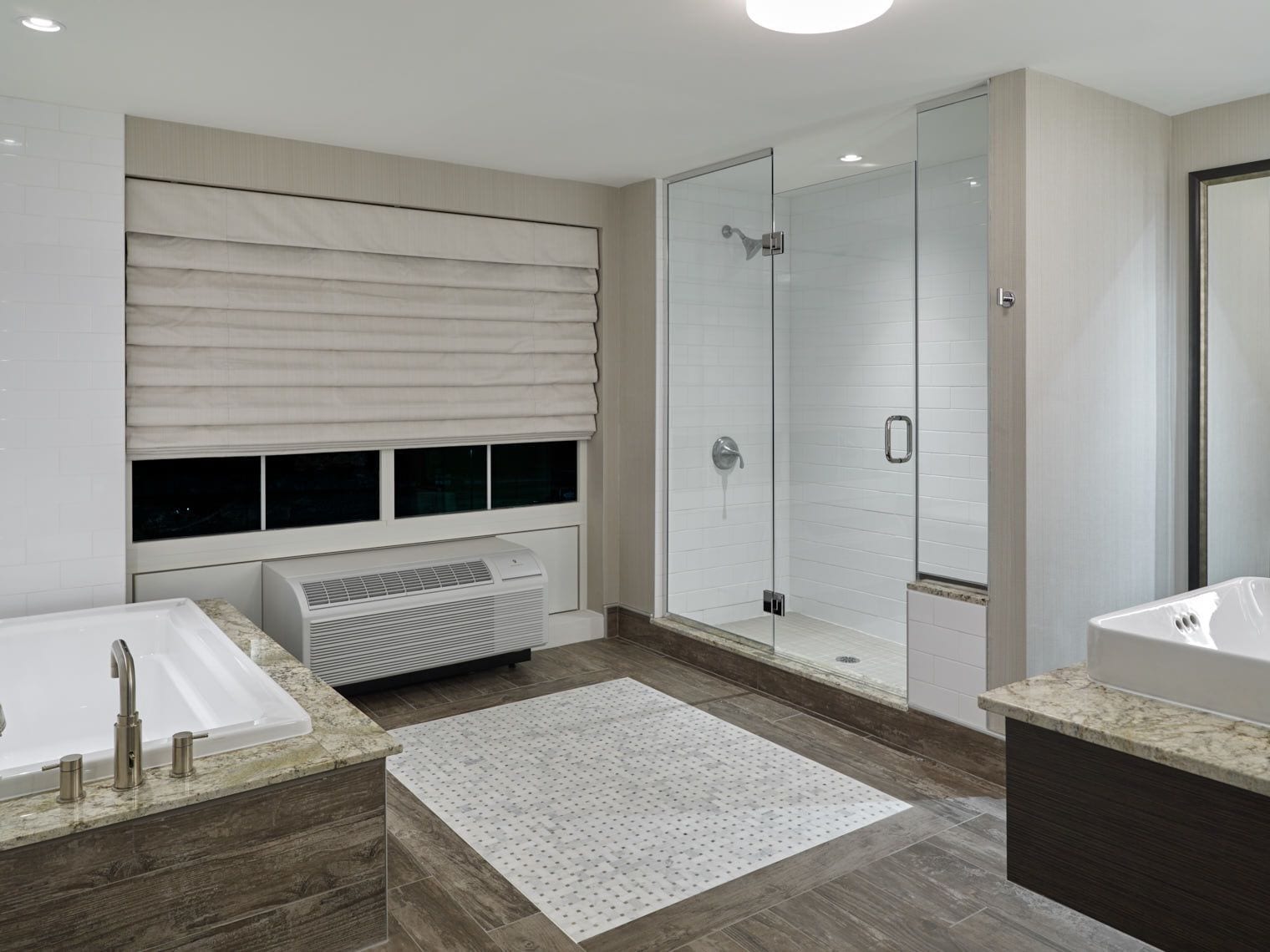 classic studio suite | bathroom | shower, hair dryer, towels
