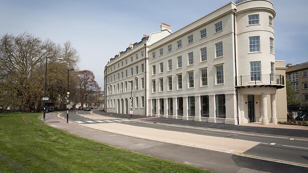 A large, historic building with multiple floors and a prominent dome on the corner. - University of Bath City Accommodation (Bath)