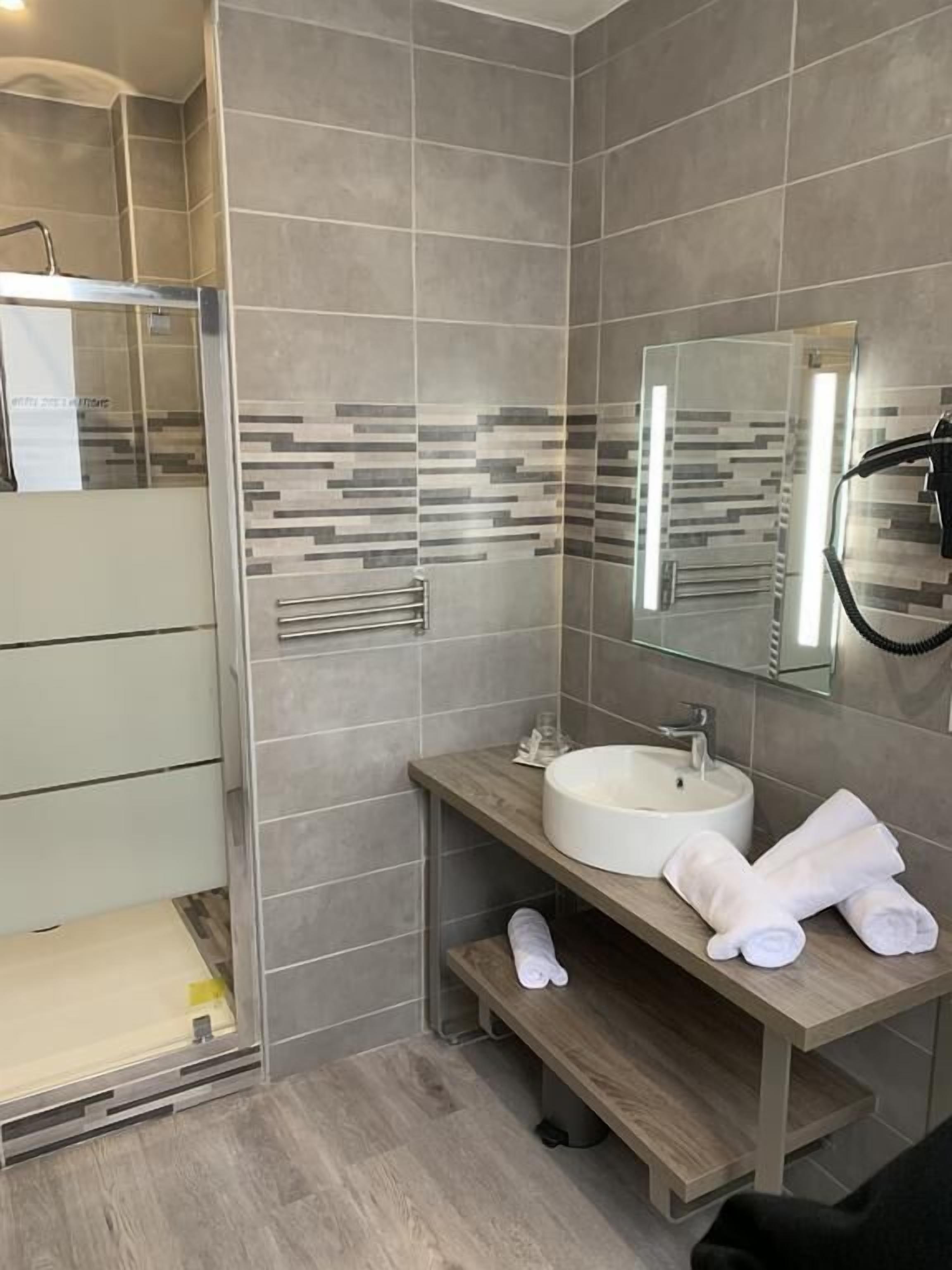 superior room, 2 single beds | bathroom | shower, hair dryer, towels, soap