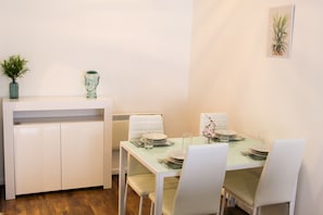Apartment, 2 Bedrooms | Living area | Flat-screen TV