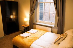 Apartment, 1 Bedroom | 1 bedroom, desk, bed sheets