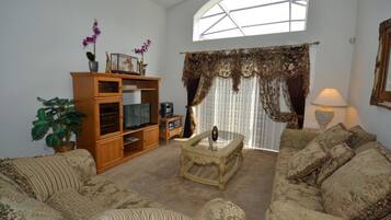 House, 4 Bedrooms | Living area | Flat-screen TV