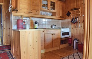 Fridge, stovetop, cookware/dishes/utensils