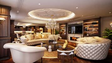 Presidential Suite, Multiple Beds, Non Smoking | Living area | 42-inch LCD TV with cable channels, TV, fireplace