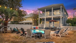 A two-story house with a balcony, a swimming pool, and outdoor furniture. - COZY & CLOSE TO BEACH, VERY CLEAN, PRIVATE POOL, PET FRIEND FEE, LSV DISCOUNT (Destin)