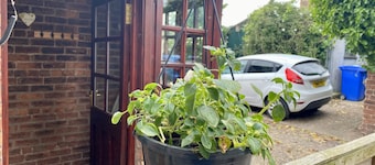 Lovely quiet cottage overlooking the Cheviot Hills, real fire, private gardens
