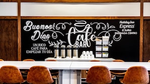 A cafe with a blackboard sign reading "Buenos Días Café Bar" and "Holiday Inn Express & Suites ENSEÑADA CENTRO". - Holiday Inn Express & Suites Ensenada Centro by IHG (Ensenada)