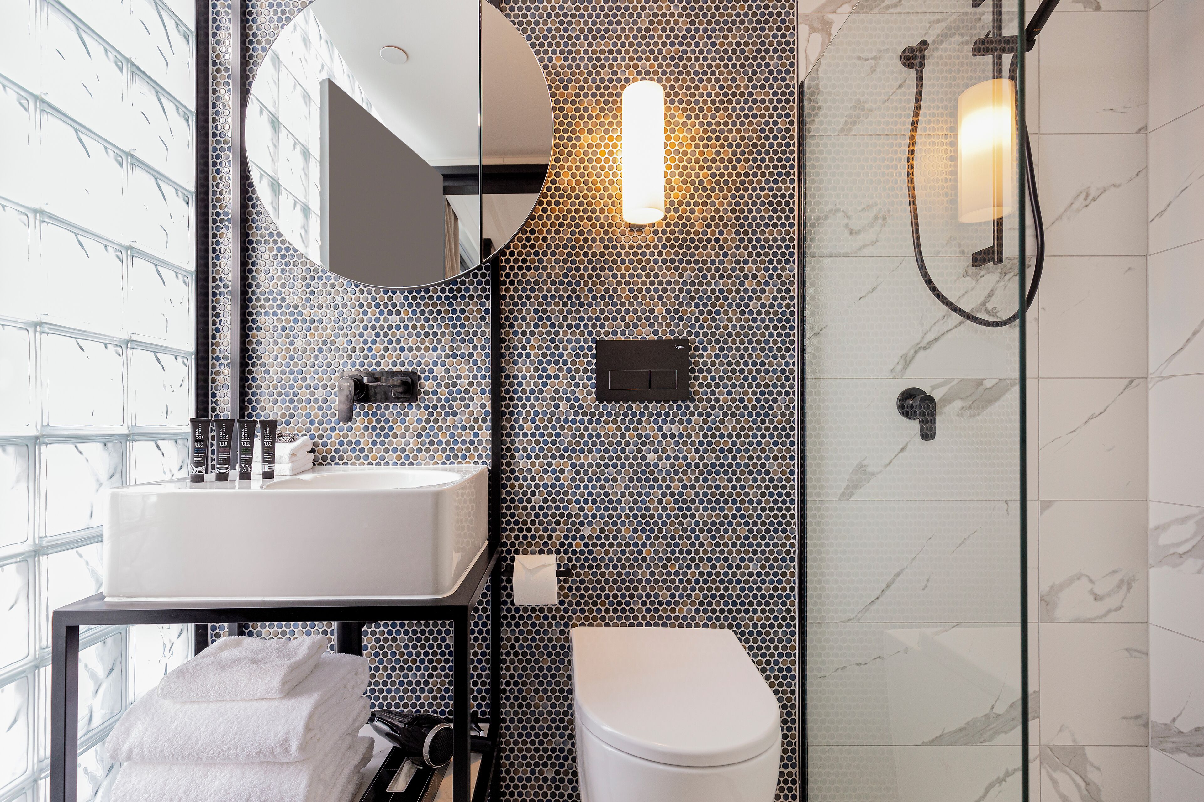 studio apartment | bathroom | shower, designer toiletries, hair dryer, towels