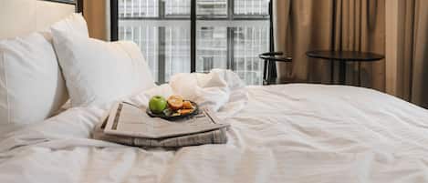 Pillow-top beds, in-room safe, blackout curtains, soundproofing