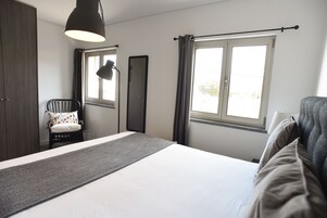 Apartment, 2 Bedrooms (Blue) | 2 bedrooms, blackout drapes, soundproofing, iron/ironing board