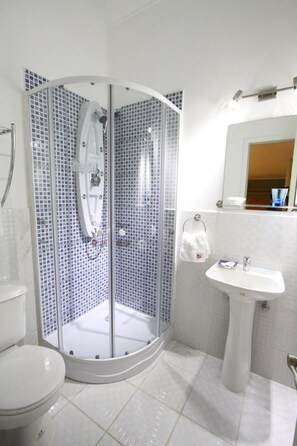Shower, free toiletries, towels