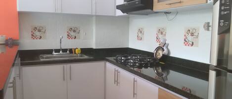 Microwave, stovetop, dishwasher, coffee/tea maker