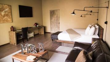 Deluxe Bungalow, 1 King Bed, Non Smoking, Pool View | In-room safe, iron/ironing board, free WiFi, bed sheets