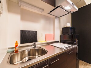 2 Bed Room | Private kitchen | Fridge, microwave, stovetop, electric kettle - IKIDANE Residential Hotel SHIMANOUCHI (Osaka)