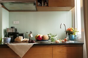 Suite Studio Deluxe, 1 grand lit, coin cuisine | Coin cuisine privé