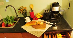 Full-size fridge, microwave, stovetop, espresso maker