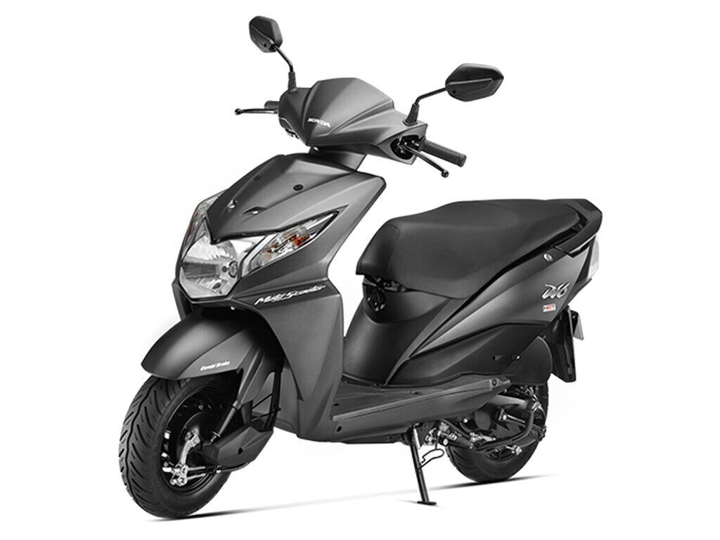 A black scooter with a sleek design, a prominent headlight, and a visible brand logo on the front.