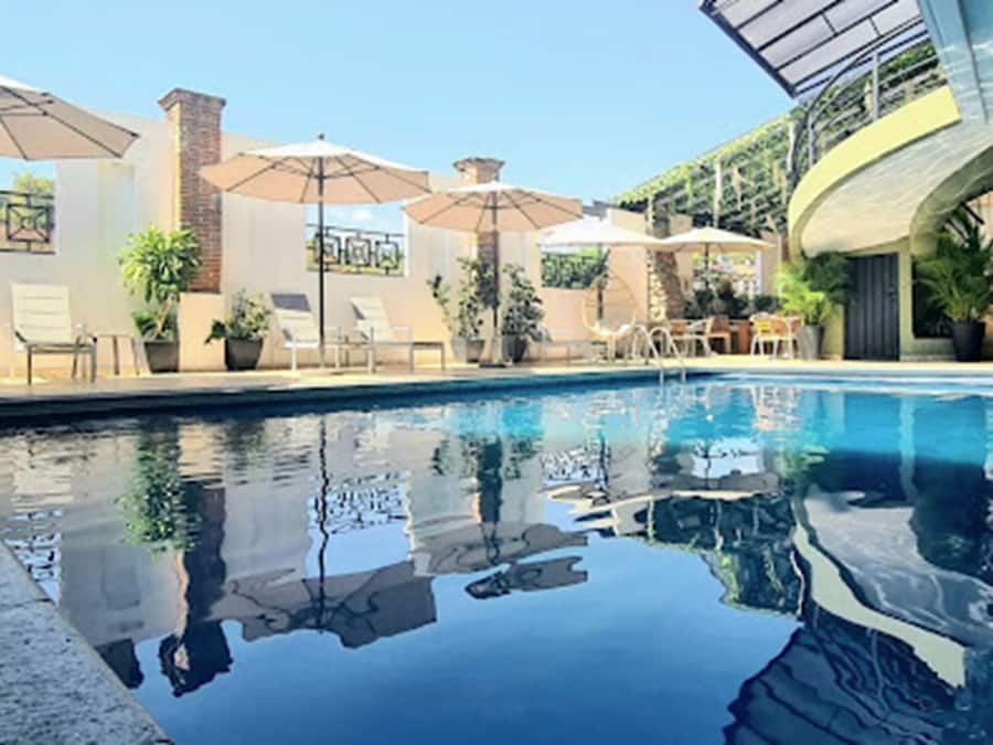 Outdoor pool, open 9:00 AM to 9:00 PM, sun loungers