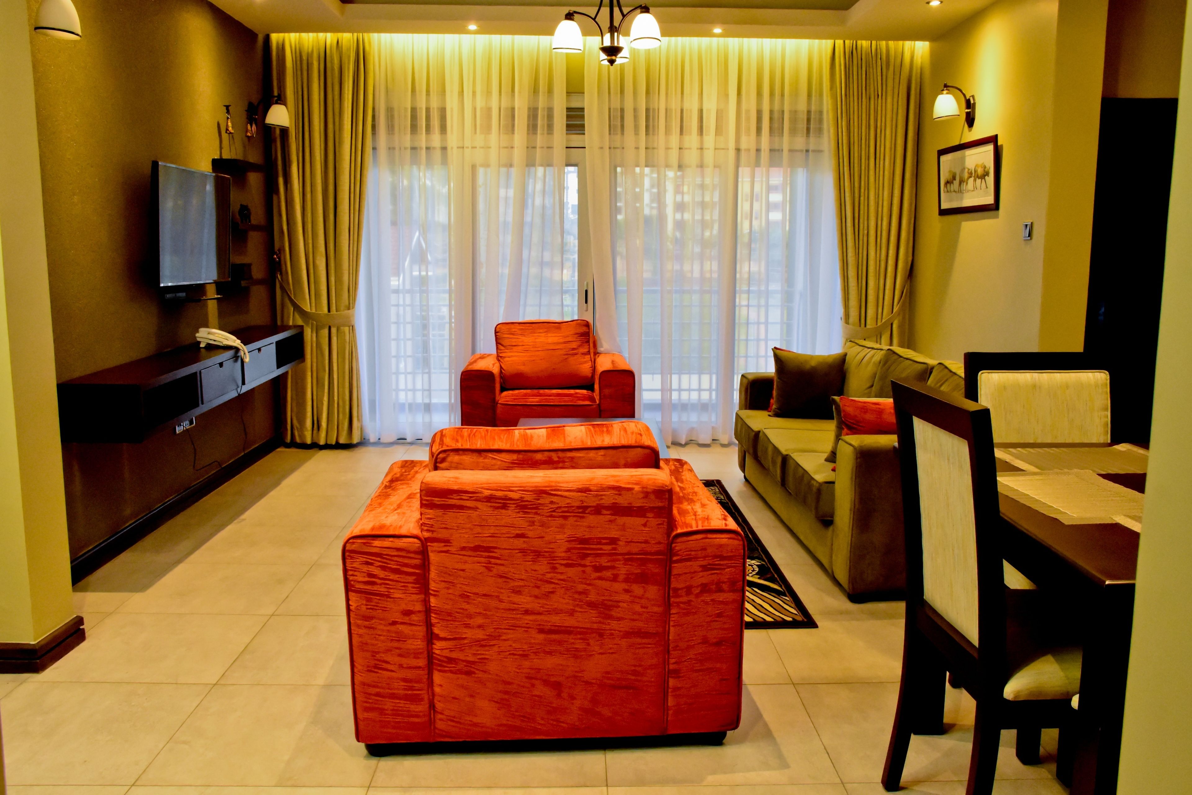 Family Apartment, 2 Bedrooms, Accessible, Hill View | Living area | Flat-screen TV