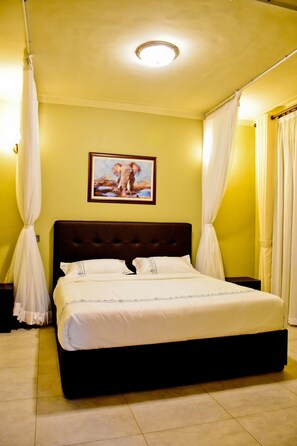 Exclusive Double Room, 1 Double Bed, Non Smoking, Hill View | Premium bedding, individually decorated, individually furnished - Greendale Apartments (Kampala)