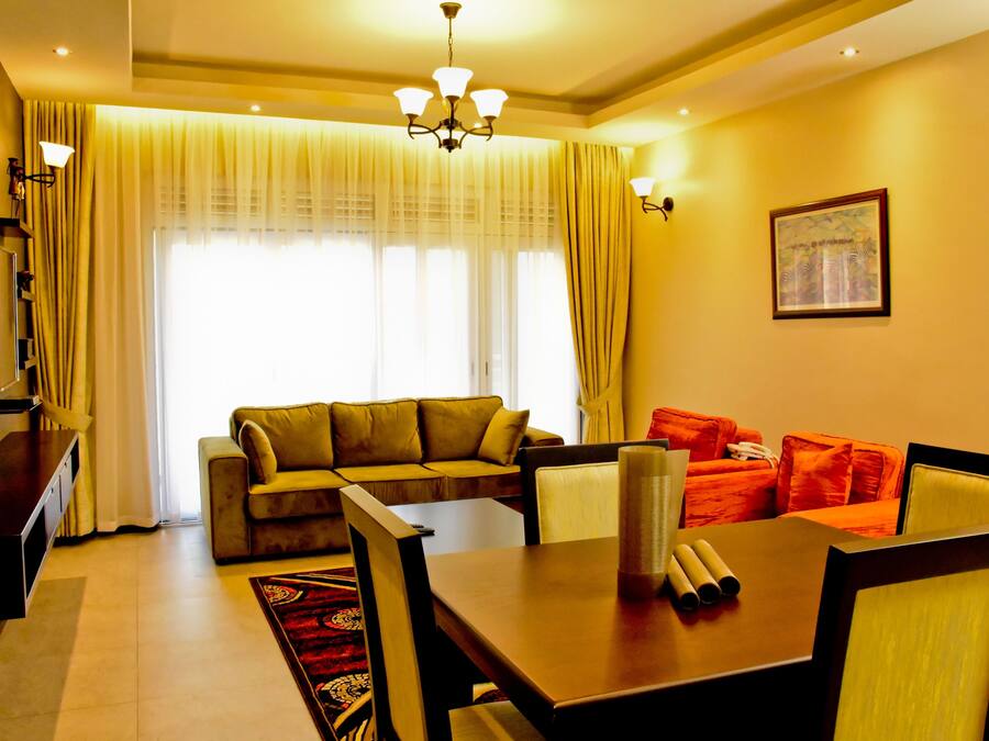 Family Apartment, 2 Bedrooms, Accessible, Hill View | Living area | Flat-screen TV